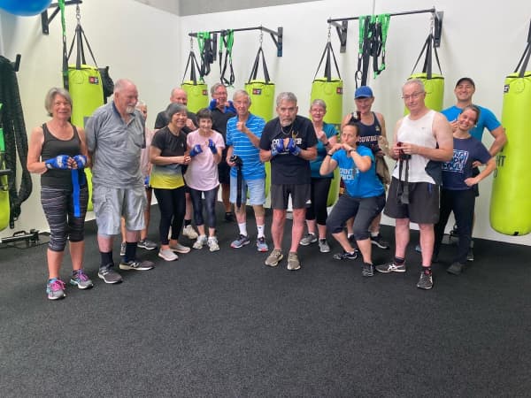 Lisa Gombinsky, neuro and rehab specialised PT and founder of Counterpunch with a group of clients in Auckland.