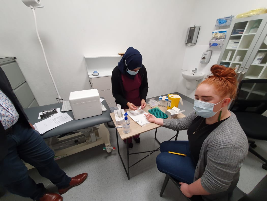 RNZ reporter Ella Stewart's blood is taken to be tested to check how protected she is from Covid-19