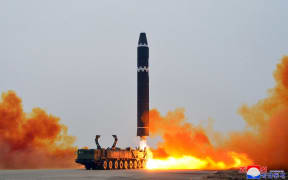 This picture taken on February 18, 2023 and released from North Korea's official Korean Central News Agency (KCNA) on February 19, 2023 shows test-firing of the intercontinental ballistic missile (ICBM) "Hwasong-15", at Pyongyang International Airport. (Photo by STRINGER / KCNA VIA KNS / AFP) / South Korea OUT / ---EDITORS NOTE--- RESTRICTED TO EDITORIAL USE - MANDATORY CREDIT "AFP PHOTO/KCNA VIA KNS" - NO MARKETING NO ADVERTISING CAMPAIGNS - DISTRIBUTED AS A SERVICE TO CLIENTS / THIS PICTURE WAS MADE AVAILABLE BY A THIRD PARTY. AFP CAN NOT INDEPENDENTLY VERIFY THE AUTHENTICITY, LOCATION, DATE AND CONTENT OF THIS IMAGE --- /