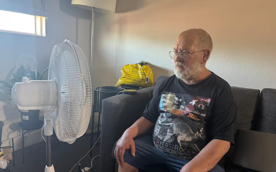 John Bieganski does not have air conditioning in his public housing unit.
