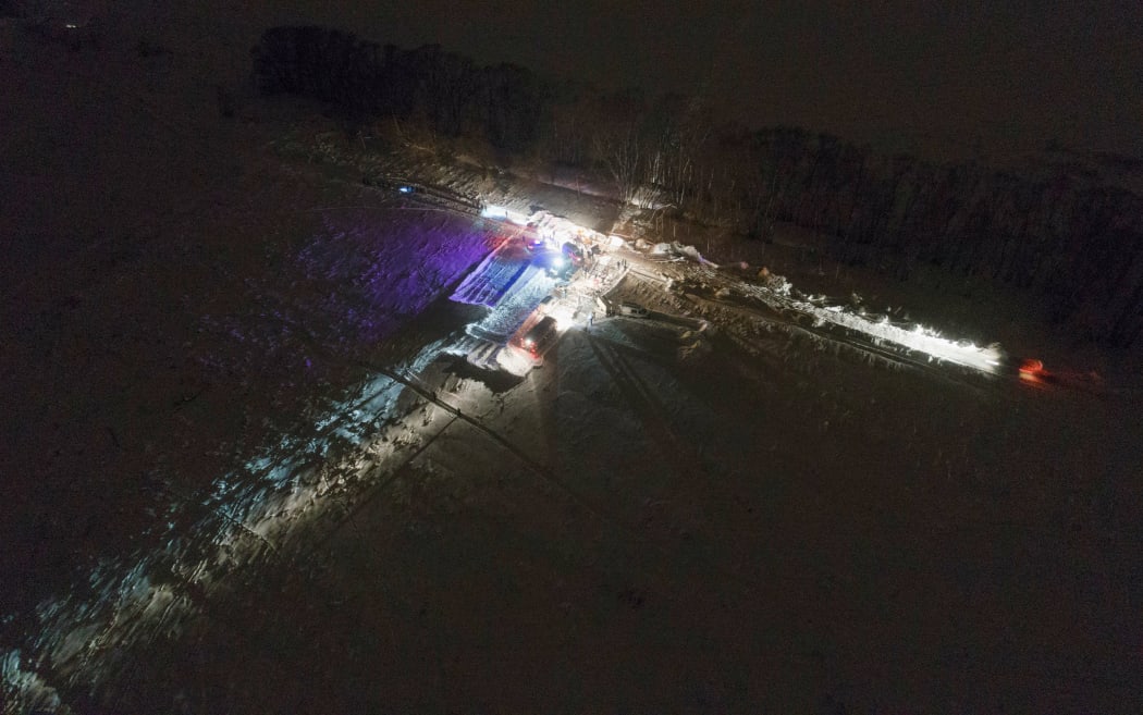 Russian emergency vehicles arrive near the site of the air crash near Moscow.