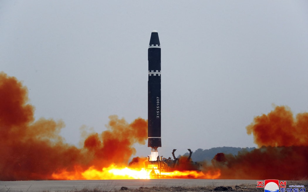 This picture taken on February 18, 2023 and released from North Korea's official Korean Central News Agency (KCNA) on February 19, 2023 shows test-firing of the intercontinental ballistic missile (ICBM) "Hwasong-15", at Pyongyang International Airport. (Photo by STRINGER / KCNA VIA KNS / AFP) / South Korea OUT / ---EDITORS NOTE--- RESTRICTED TO EDITORIAL USE - MANDATORY CREDIT "AFP PHOTO/KCNA VIA KNS" - NO MARKETING NO ADVERTISING CAMPAIGNS - DISTRIBUTED AS A SERVICE TO CLIENTS / THIS PICTURE WAS MADE AVAILABLE BY A THIRD PARTY. AFP CAN NOT INDEPENDENTLY VERIFY THE AUTHENTICITY, LOCATION, DATE AND CONTENT OF THIS IMAGE --- /