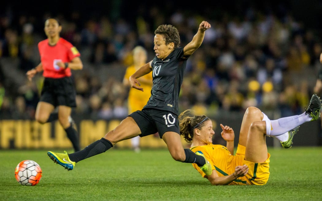 Sarah Gregorius lunges as she runs with the ball as she she passes defenders a game against Australia in 2016.