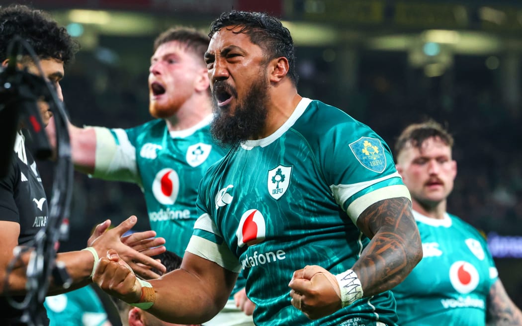 Ireland’s Bundee Aki celebrates Josh van der Flier scoring a try against All Blacks 2024.