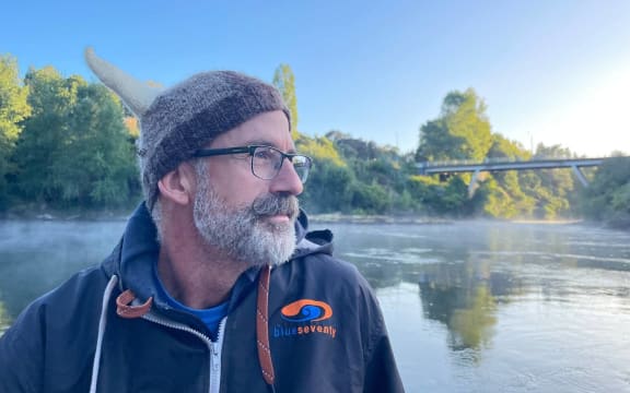 Ultra endurance swimmer Brian Gray in front of the Waikato River