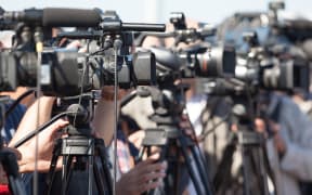 Covering an media event with a video camera
