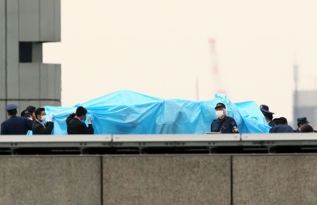 Staff at the official residence discovered the 50cm craft on top of the five-storey structure on Wednesday (local time).