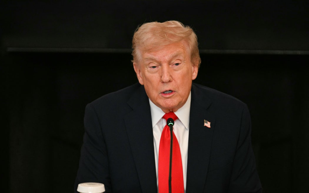 US President Donald Trump speaks during a roundtable about Antifa in the State Dining Room of the White House in Washington, DC, on October 8, 2025.