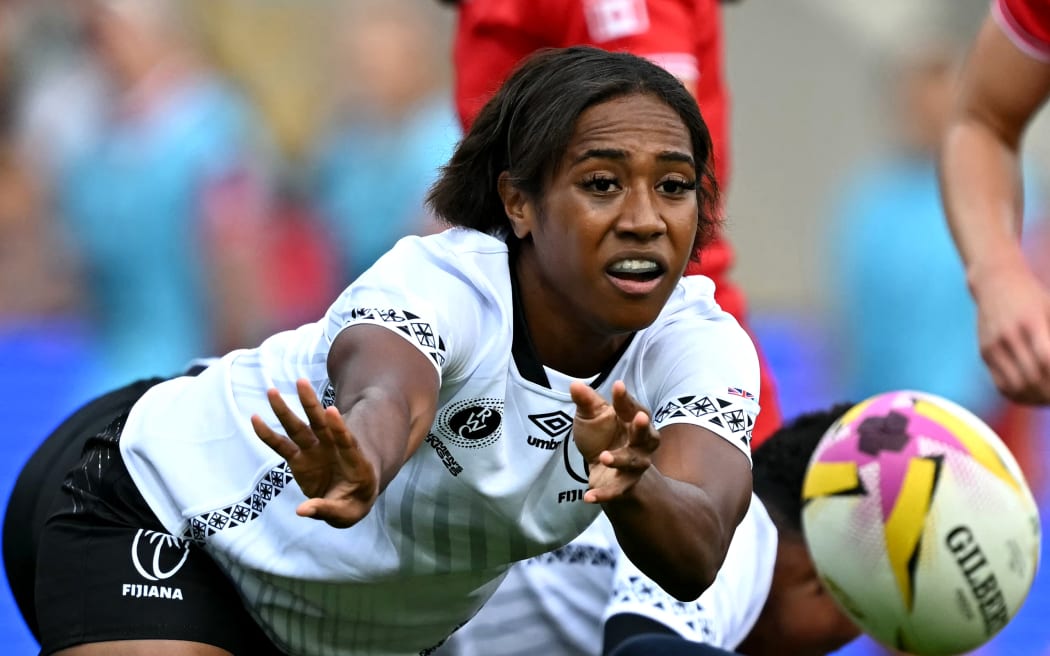 Fiji's scrum half Kolora Lomani passes the ball during the match between Canada and Fiji, which Canada won 65-7.