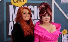 In this photo taken on April 11, 2022, Wynonna Judd and Naomi Judd of The Judds attend the 2022 CMT Music Awards in Nashville, Tennessee. US country music star Naomi Judd has died at age 76.