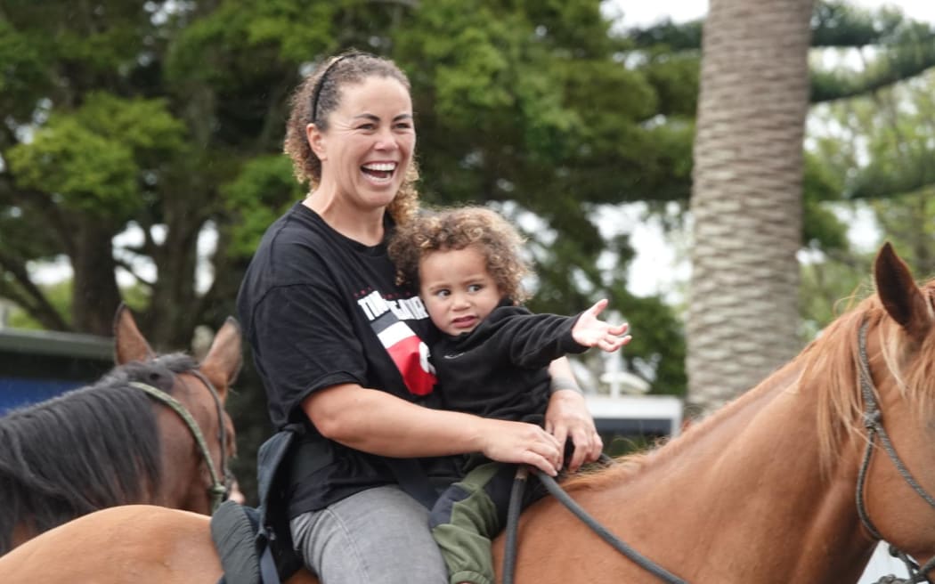 Hikoi participants on horseback, Kaitaia, on 11 November 2024.