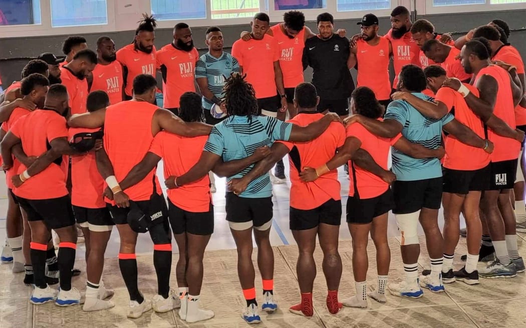 The Flyng Fijians in a huddle at their training run in Marseille on 13 October, 2023.