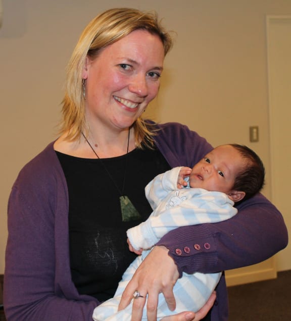 A photo of Christchurch Midwife, Cara Meredith, with baby Sondra