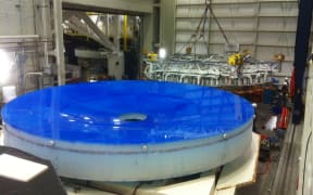 The huge mirror being built for the telescope.