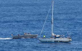 The women and their dogs were rescued after a fishing boat alerted the US authorities.