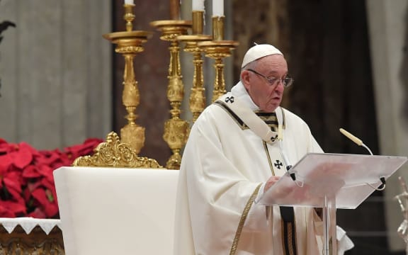 Pope Francis celebrates a mass on Christmas eve.