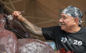 The pou maumahara was carved by master carver James Rickard along with tutors and students over four years.
