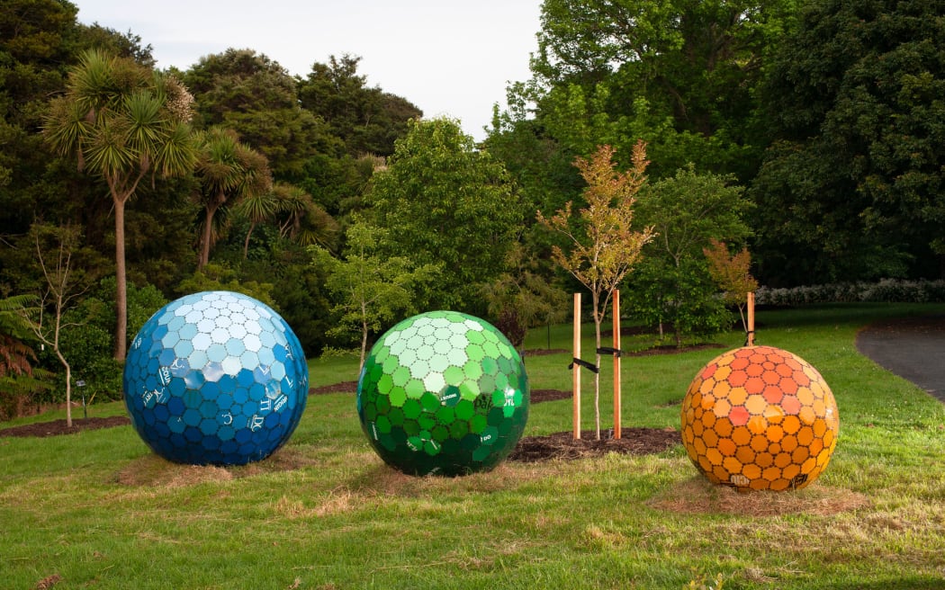 Three colourful patchwork globes by artists Metal Metcalfe are a highlight of this year’s Sculpture in the Gardens exhibition.