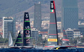 Italy's Luna Rossa and Britain's Ineos Britannia compete in the 37th America's Cup-Luis Vuitton final race, off the coast of Barcelona on 26 September. (Photo by LLUIS GENE / AFP)