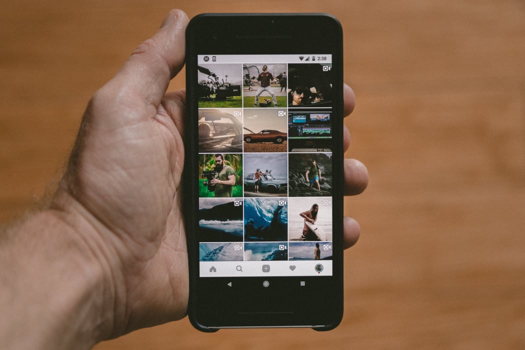 social media on smartphone. Android. holding smartphone.
