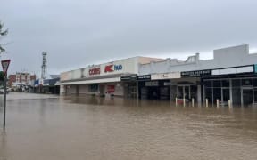 This street in Ingham is entirely flooded. (Supplied: Kieran Volpe)