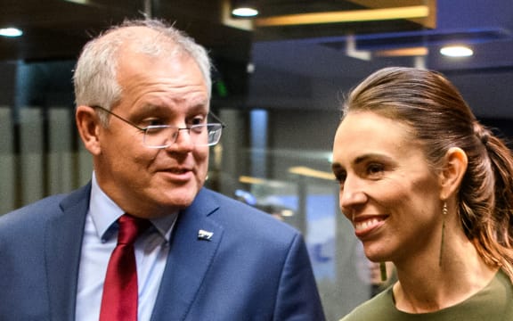 Australian Prime Minister Scott Morrison and New Zealand Prime Minister Jacinda Ardern arriving at a reception for the annual Australia-New Zealand Leaders' meeting in Queenstown on May 30, 2021.
