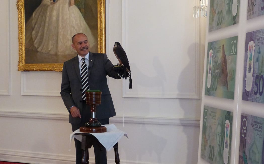 Governor-General Sir Jerry Mateparae poses with the native falcon karearea at the launch.