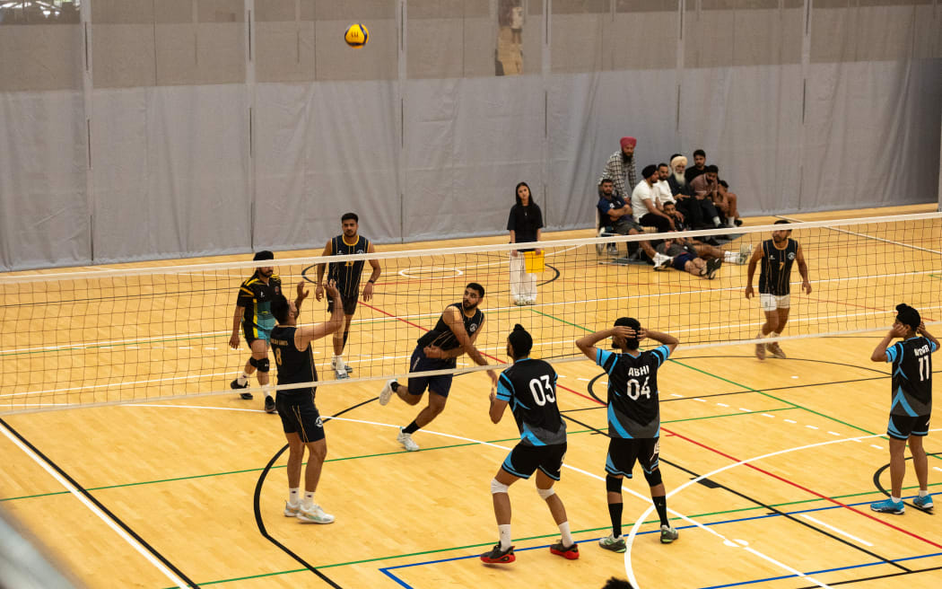Players compete in a volleyball match during the 2025 Sikh Games at Bruce Pullman Park, Takanini.
