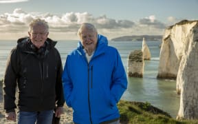 Keith Scholey and David Attenborough on location while filming 'Ocean with David Attenborough'.