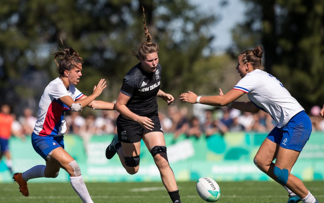 Tiana Davison NZL (centre) iduring the Rugby Sevens Women's Gold Medal Match