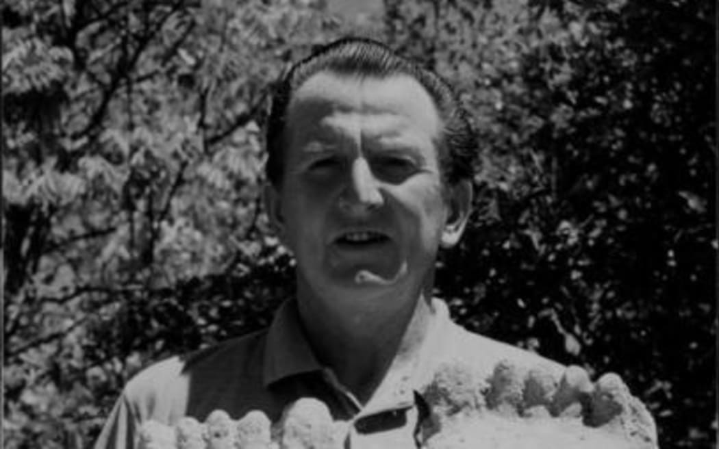 Australian cryptozoologist Rex Gilroy with casts of two footprints he believes were left by the Moehau 'man-beast'
