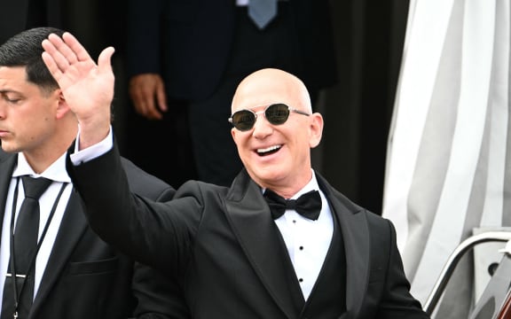 Amazon's founder Jeff Bezos leaves the Aman Hotel on his wedding day in Venice on June 27, 2025.  (Photo by Stefano Rellandini / AFP)