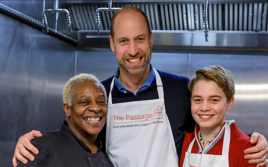 Prince William and his son George at The Passage, London.