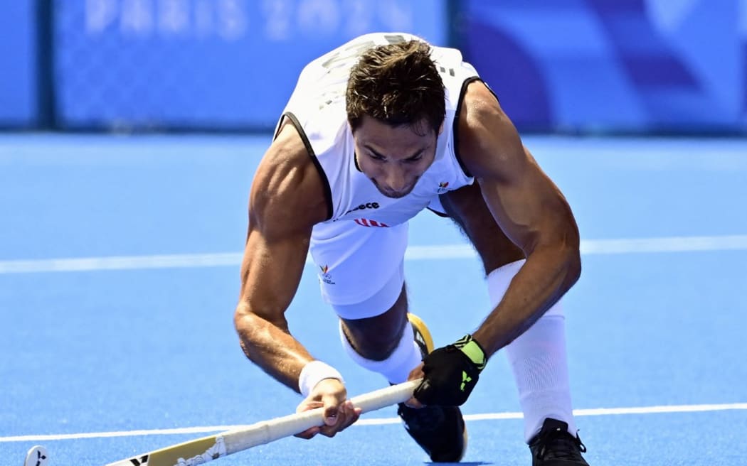 Belgium's Alexander Hendrickx pictured in action during a hockey game between Belgium's national team the Red Lions and Spain, a quarter-final game at the Paris 2024 Olympic Games, on Sunday 04 August 2024 in Paris, France. The Games of the XXXIII Olympiad are taking place in Paris from 26 July to 11 August. The Belgian delegation counts 165 athletes competing in 21 sports. BELGA PHOTO DIRK WAEM (Photo by DIRK WAEM / BELGA MAG / Belga via AFP)