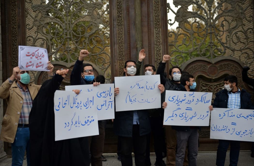 TEHRAN, IRAN - NOVEMBER 28: A group of demonstrator gather to protest gathering against the assassination of the Iranian Top nuclear scientist  Mohsen Fakhrizadeh Mahabadi, in southern Tehran, Iran on November 28, 2020.