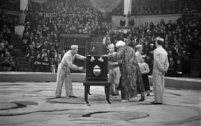 Magician Emil Kio performs at the Moscow Circus in 1939.