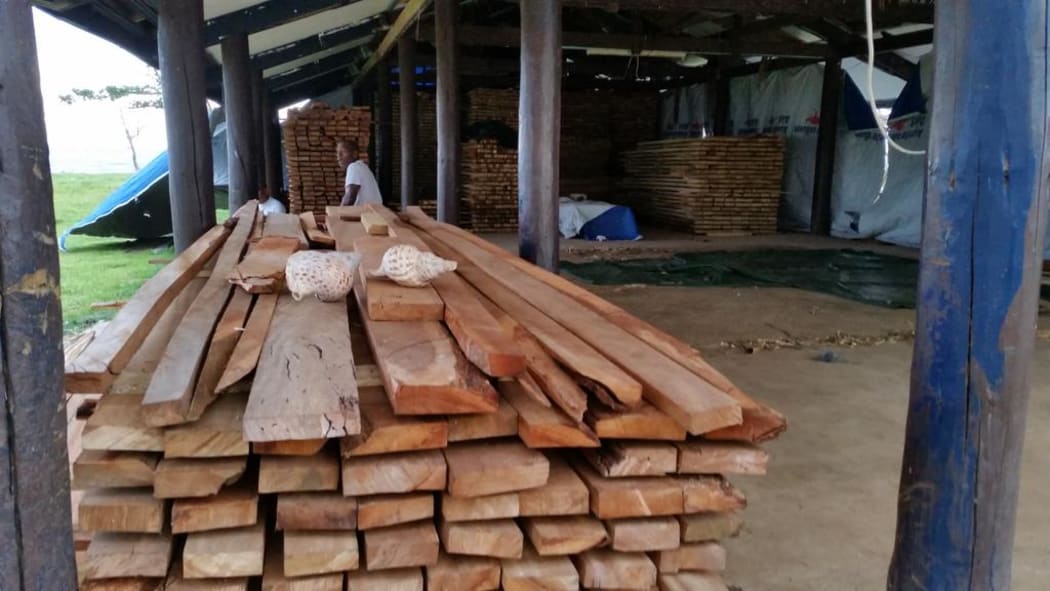 People on Koro Island are too desperate to wait for supplies and have cut wood from the forest themselves. There's enough here for 100 homes.