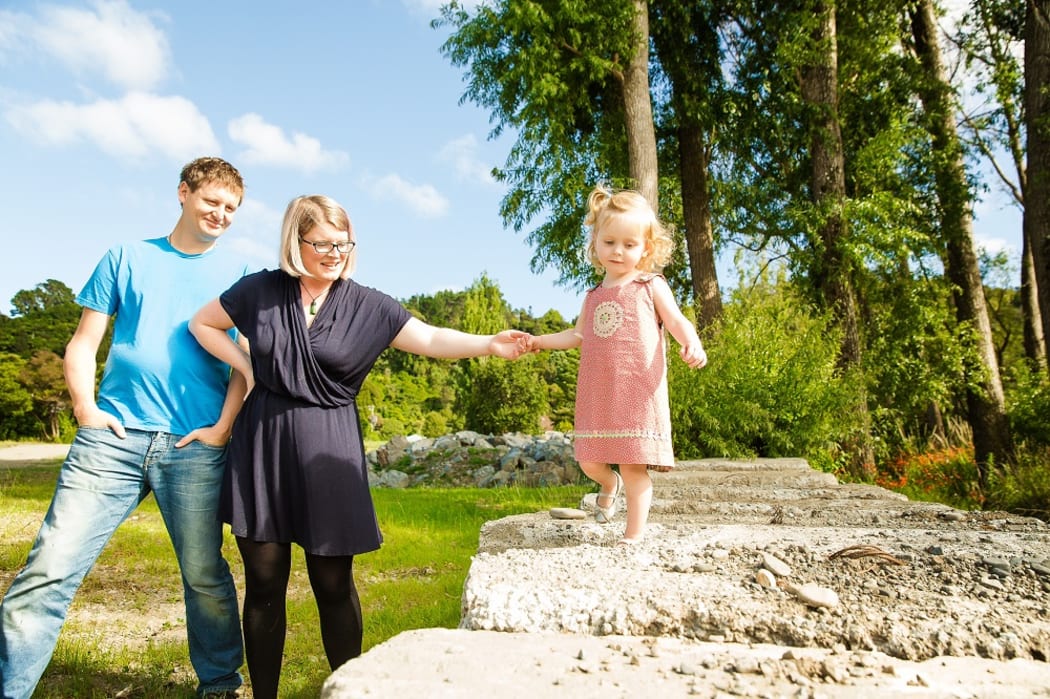 Holly, her partner Dave and their daughter Esther.