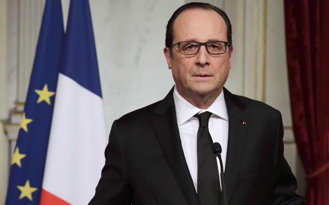 French President Francois Hollande reacts to the killings at the Elysee Palace in Paris.