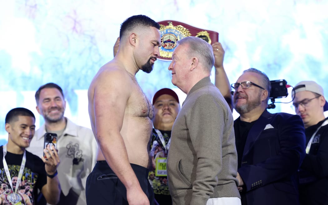 Frank Warren pretends to face off with Joseph Parker.