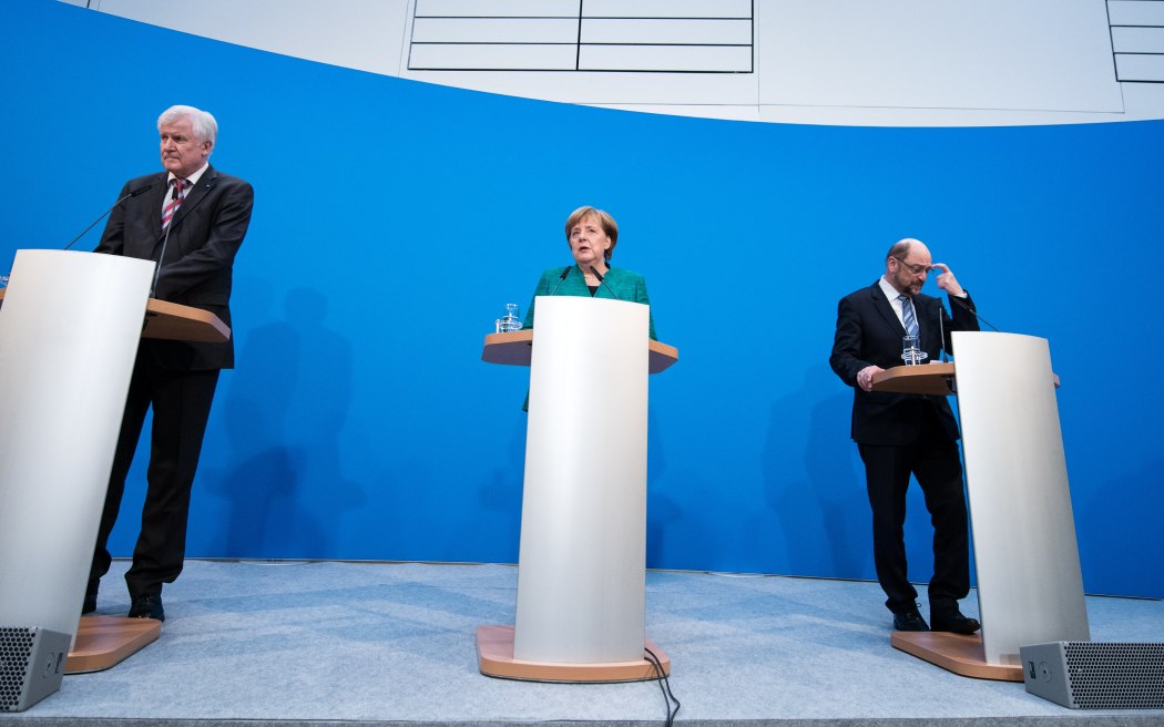 Premier of Bavaria and chairman of the Christian Social Union Horst Seehofer,  German Chancellor and chairwoman of the Christian Democratic Union (CDU) Angela Merkel, and Social Democratic Party (SPD) chairman Martin Schulz announce they have negotiated a coalition agreement.