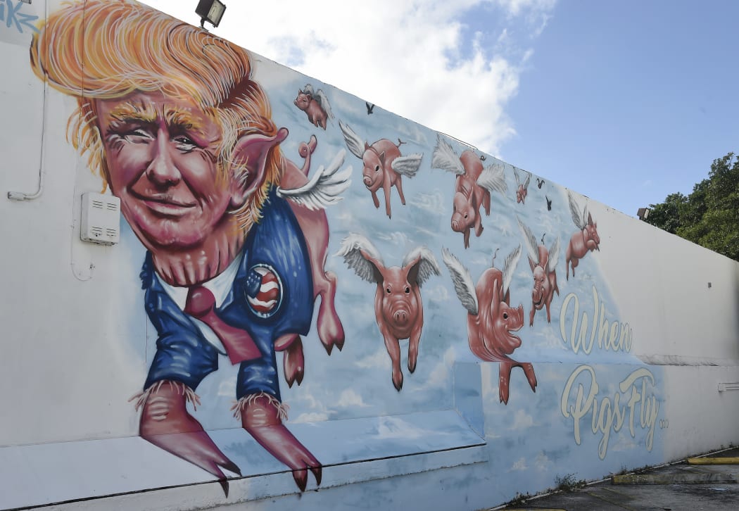 Mural "When Pigs Fly" by Miami artists Rei Ramirez and Ivan Roque.