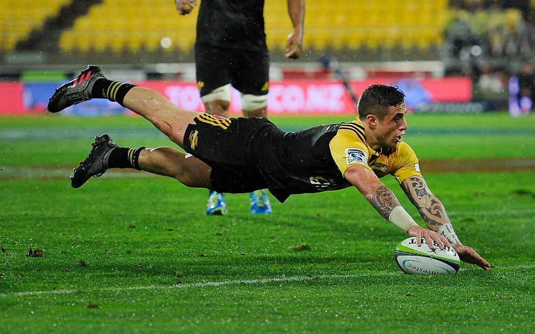 TJ Perenara dots down for the Hurricanes against the Sharks in Wellington.