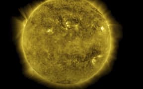 This NASA image obtained July 1, 2020, captured from a video, shows an image from a 10-year time lapse of the Sun at 17.1 nanometers (an extreme ultraviolet wavelength that shows the Sun’s outermost atmospheric layer – the corona) with the rise and fall of the solar cycle and notable events, like transiting planets and solar eruptions. As of June 2020, NASA’s Solar Dynamics Observatory – SDO – has now been watching the Sun non-stop for over a full decade. From its orbit in space around Earth, SDO has gathered 425 million high-resolution images of the Sun, amassing 20 million gigabytes of data over the past 10 years. (Photo by Handout / NASA/GSFC / AFP) / RESTRICTED TO EDITORIAL USE - MANDATORY CREDIT "AFP PHOTO /NASA/GSFC/HANDOUT" - NO MARKETING - NO ADVERTISING CAMPAIGNS - DISTRIBUTED AS A SERVICE TO CLIENTS