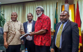 On 30 April 2019, members of Papua New Guinea's Ombudsman Commission delivered to the Speaker of Parliament, Job Pomat, its report into the UBS loan.