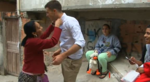 A favela dweller smartens up jack Tame for TVNZ.