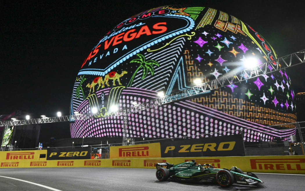 Aston Martin's Canadian driver Lance Stroll races during the second practice session for the Las Vegas Formula One Grand Prix on November 17, 2023, in Las Vegas, Nevada. (Photo by ANGELA WEISS / AFP)