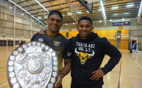 Seta Tamanivalu and Waisake Naholo holding the Ranfurly Shield at training at the TSB Stadium.