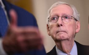 (FILES) US Senate Minority Leader Mitch McConnell, Republican from Kentucky, listens during a press conference after Republican senators met for a policy luncheon at the US Capitol in Washington, DC, on February 6, 2024. McConnell announced on February 28, 2024 that he will step down as Republican leader of the US Senate in November.