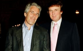 Portrait of American financier Jeffrey Epstein (left) and real estate developer Donald Trump as they pose together at the Mar-a-Lago estate, Palm Beach, Florida on February 22, 1997.